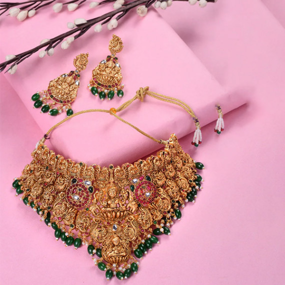 https://letshopz.com/products/gold-plated-kemp-stone-studded-lakshmi-design-with-dangling-green-beads-choker-set